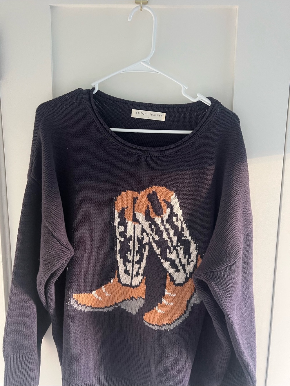 Stitch & Feather Black Knit Crewneck Sweater with Tan Boot Motif